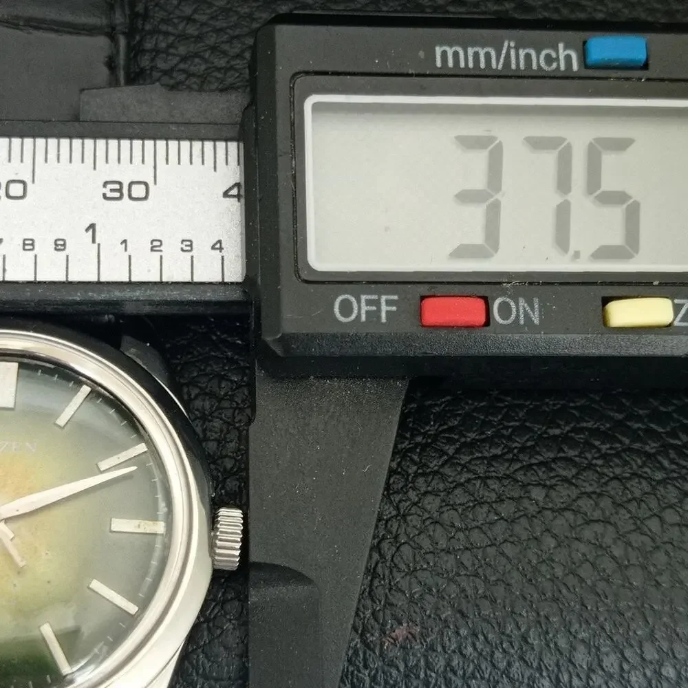 Vintage 1984 Citizen Manual Wound Mens Silver Watch & Olive accents